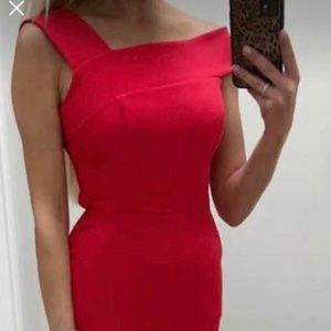 BCBG RED JUMPSUIT - BRAND NEW - SIZE 02 but fits like a small